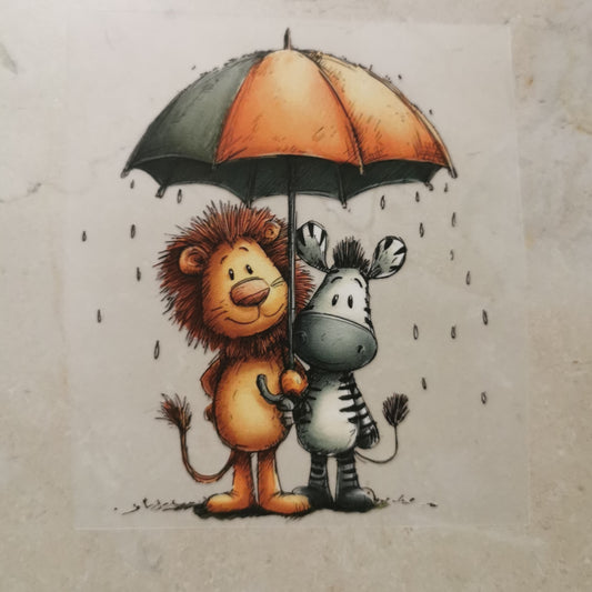 Bügelbild Regentag Löwe und Zebra